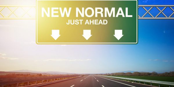 New Normal After Coronavirus. New normal road sign. New Normal After Coronavirus. New normal road sign. Horizontal composition with copy space. Global Health and COVID-19 pandemic concept.